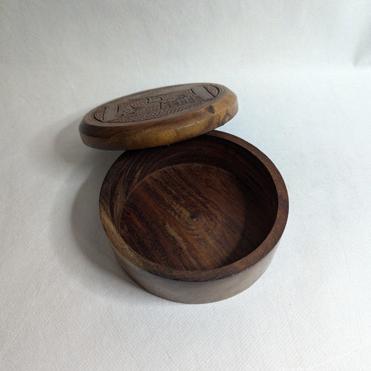 Round teak wood box with brass and wood inlay: Elegant, handcrafted storage.