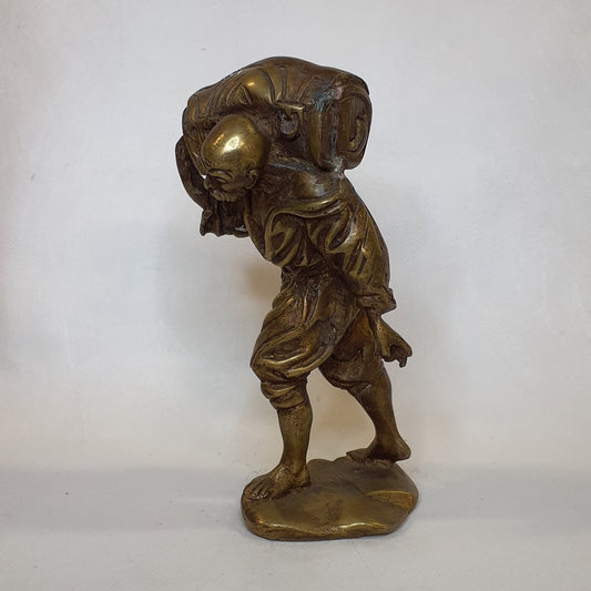Brass dockworker figurine: Hand-forged and patinated using traditional casting methods