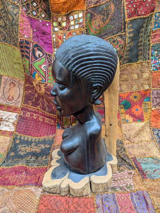 Ebony bust of a woman: Hand-carved artwork in deep black precious wood
