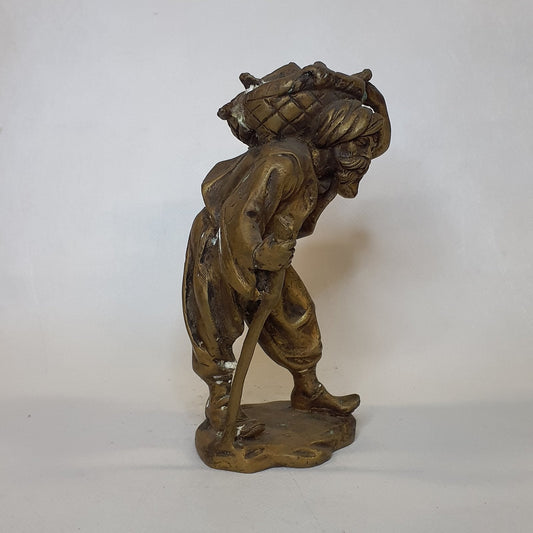 Merchant figure made of brass: Hand-forged and patinated using the traditional casting method