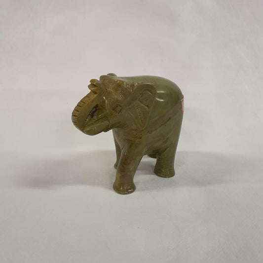 Elephant statue made of soapstone: Hand-carved symbol of luck and strength