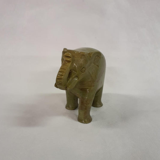 Elephant statue made of soapstone: Hand-carved symbol of luck and strength