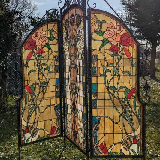 Tiffany room divider: Exclusive interplay of light with a wrought iron metal frame