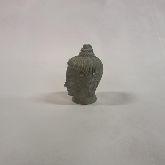 Buddha head made of soapstone: Hand-carved symbol of peace and spirituality