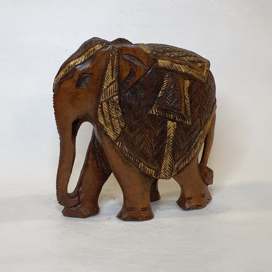 Elephant statue made of teak wood: Hand-carved symbol of luck and strength