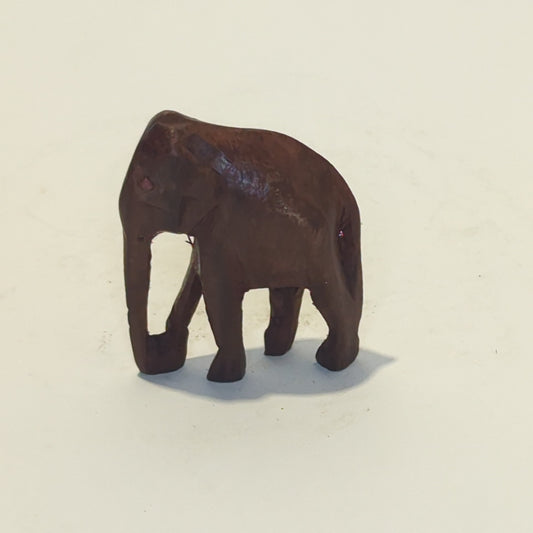 Hand-carved rosewood elephant: An exquisite miniature with symbolic power