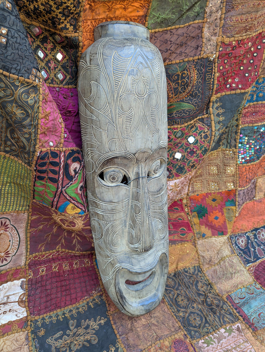 Hand-carved wooden mask from Thailand: A unique piece of Thai culture and craftsmanship