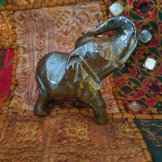 Elephant figurine made of tiger iron: Handmade unique piece made of natural stone