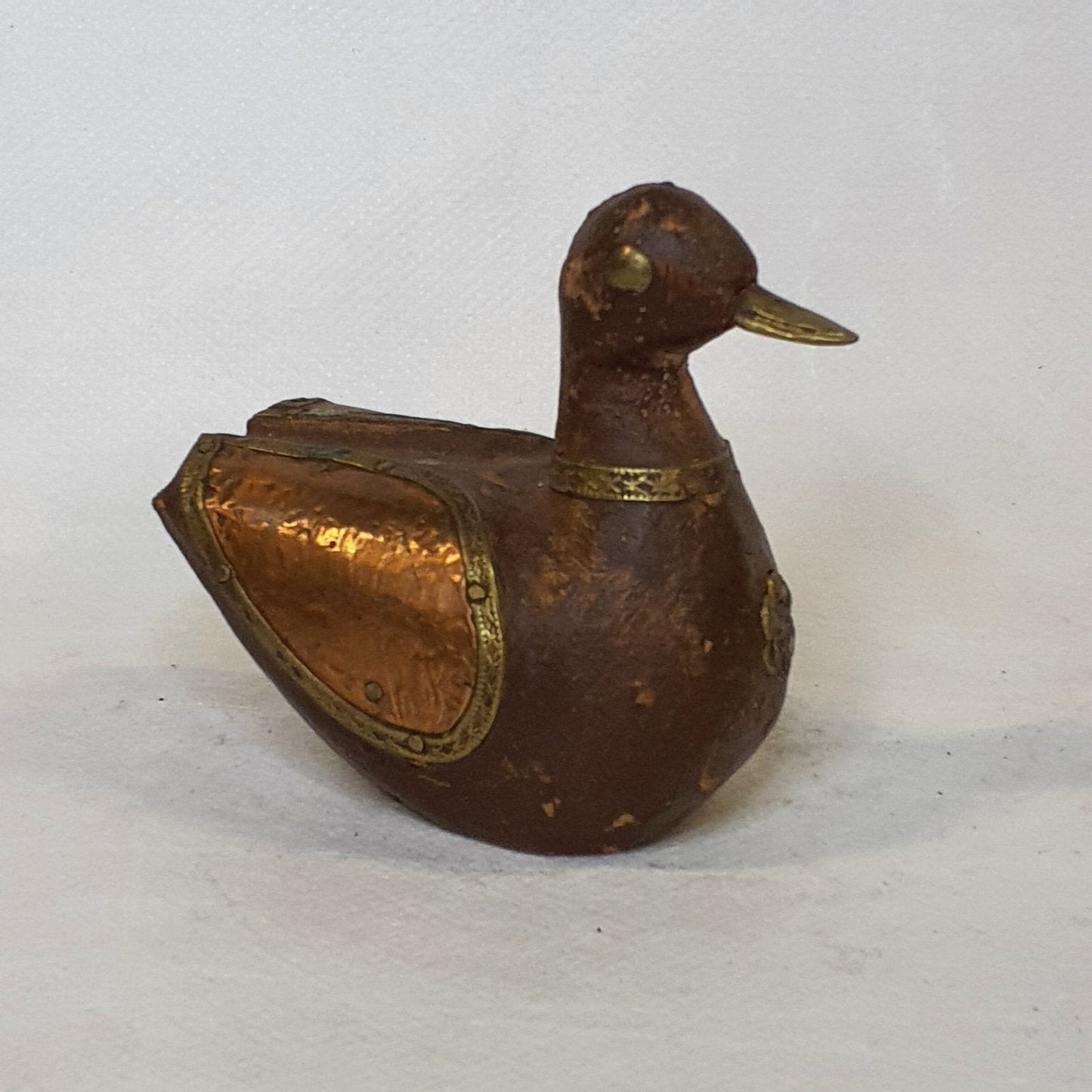 Wooden duck with metal fittings: Hand-carved unique piece in rustic style