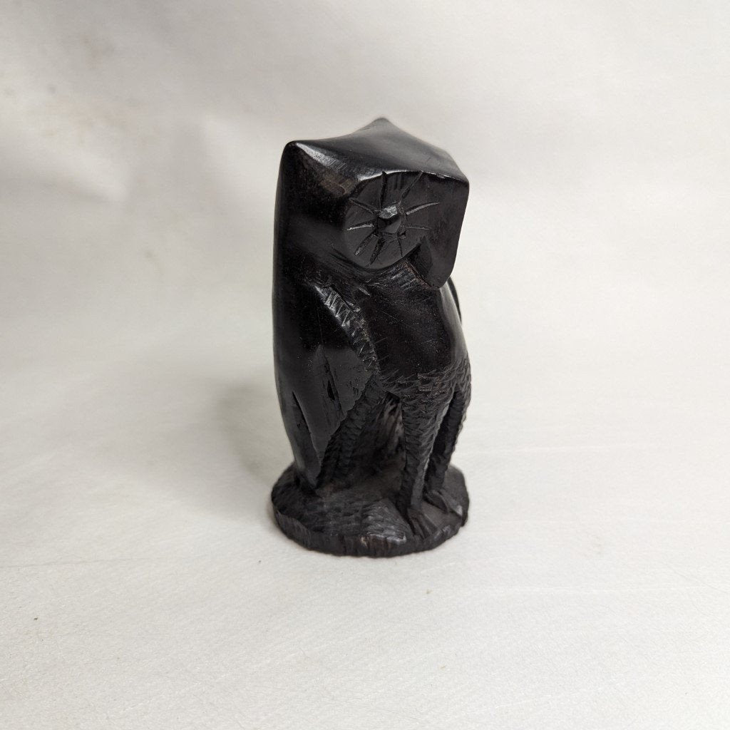 Ebony owl figurine: Hand-carved unique piece in exquisite blackwood