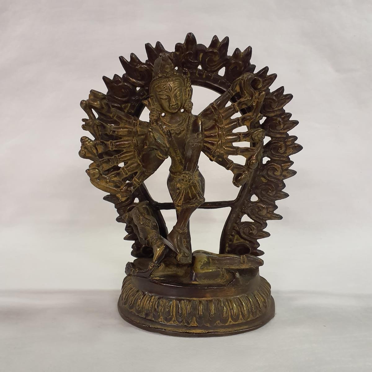 Warrior goddess Durga in brass: Hand-forged and patinated statue for strength and protection