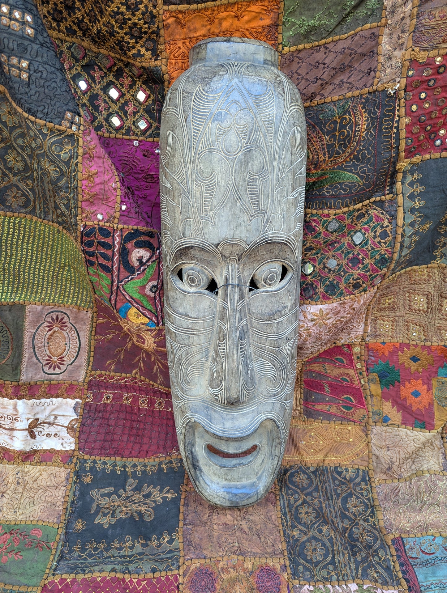 Hand-carved wooden mask from Thailand: A unique piece of Thai culture and craftsmanship