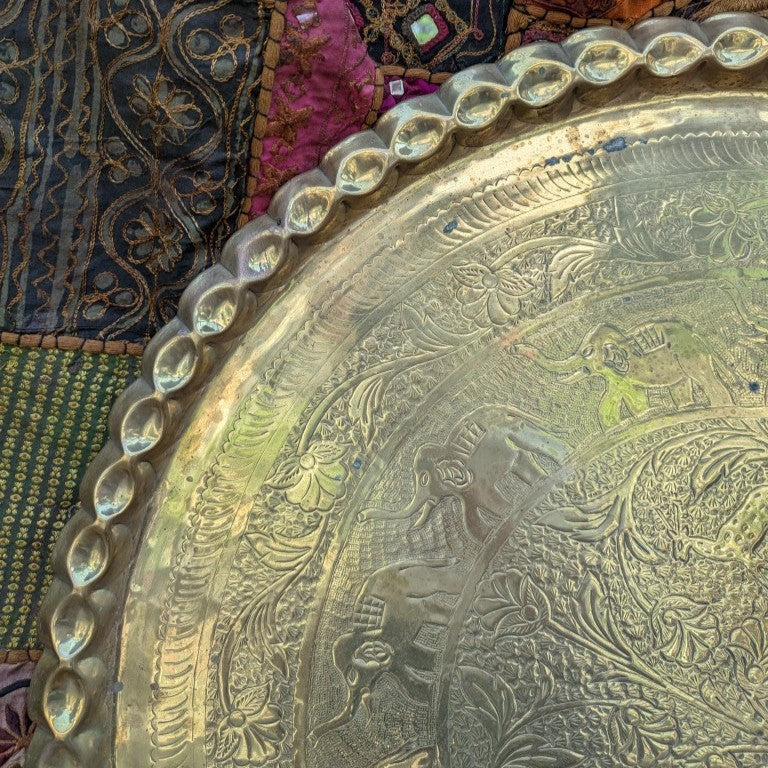 Exotic brass plate with elephant motif: Hand-hammered on a carved teak wood frame
