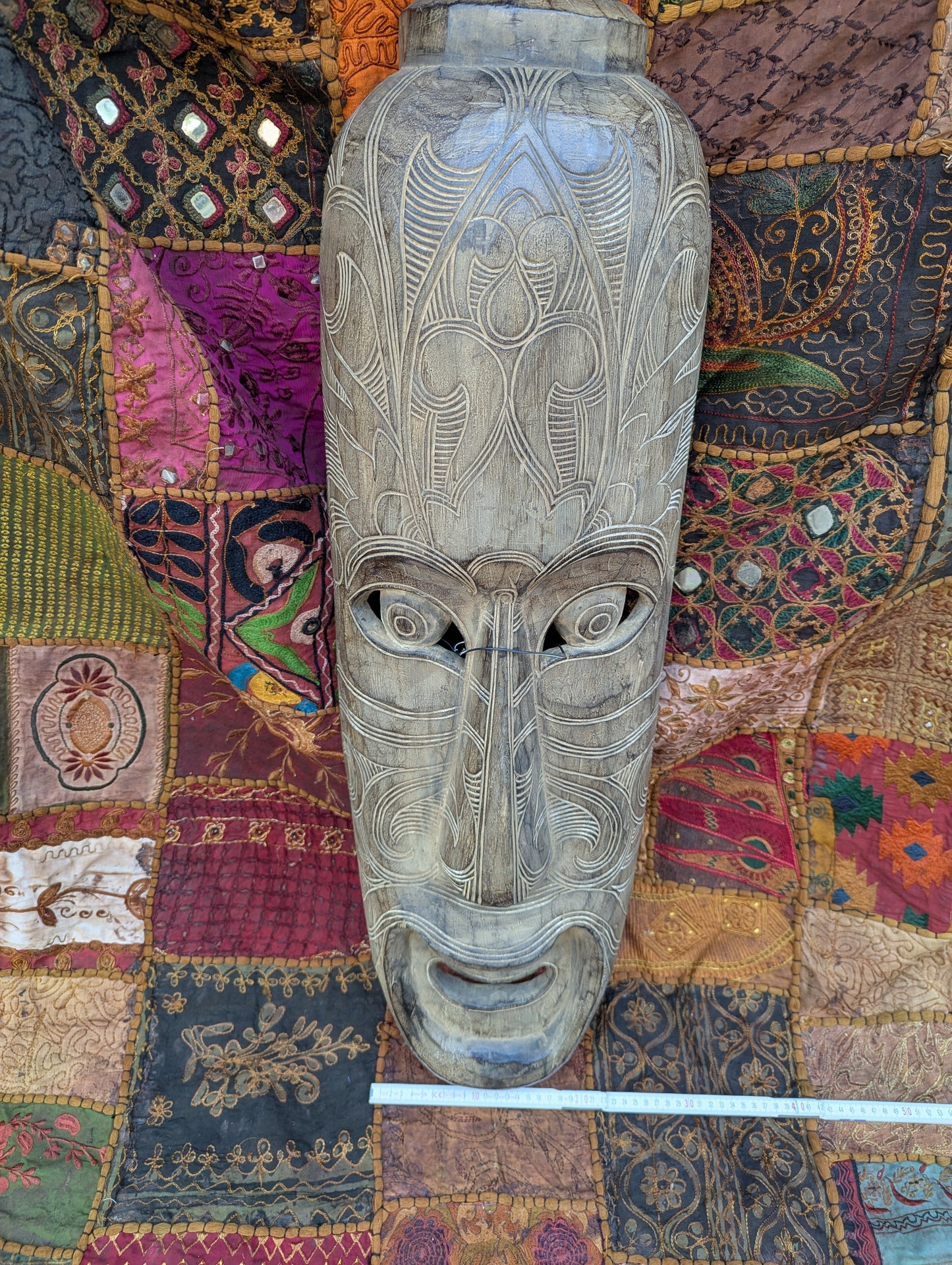 Hand-carved wooden mask from Thailand: A unique piece of Thai culture and craftsmanship