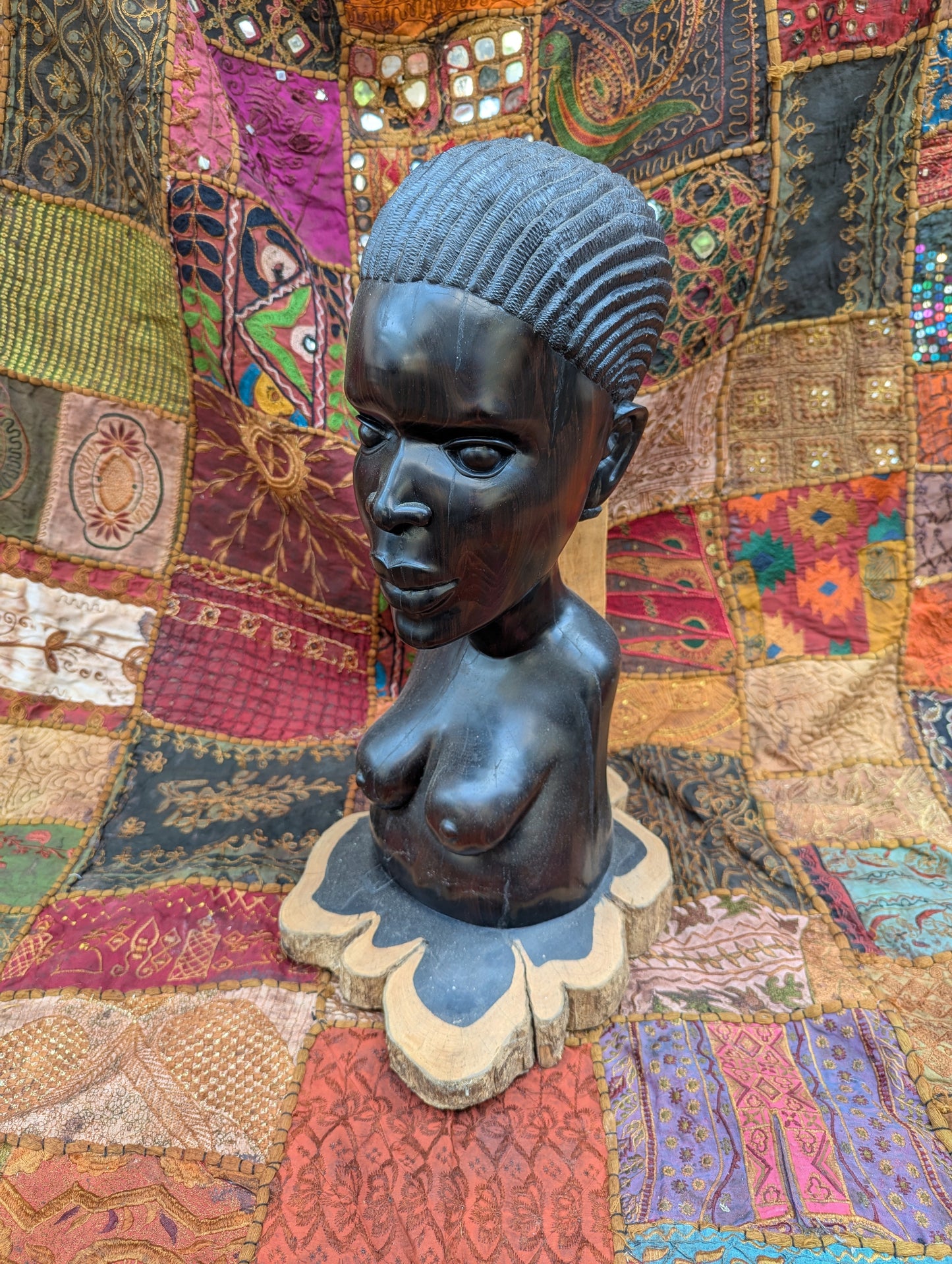 Ebony bust of a woman: Hand-carved artwork in deep black precious wood
