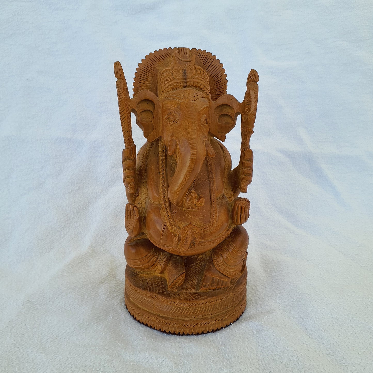 Ganesha figure made of sandalwood: Artfully carved with spiritual depth