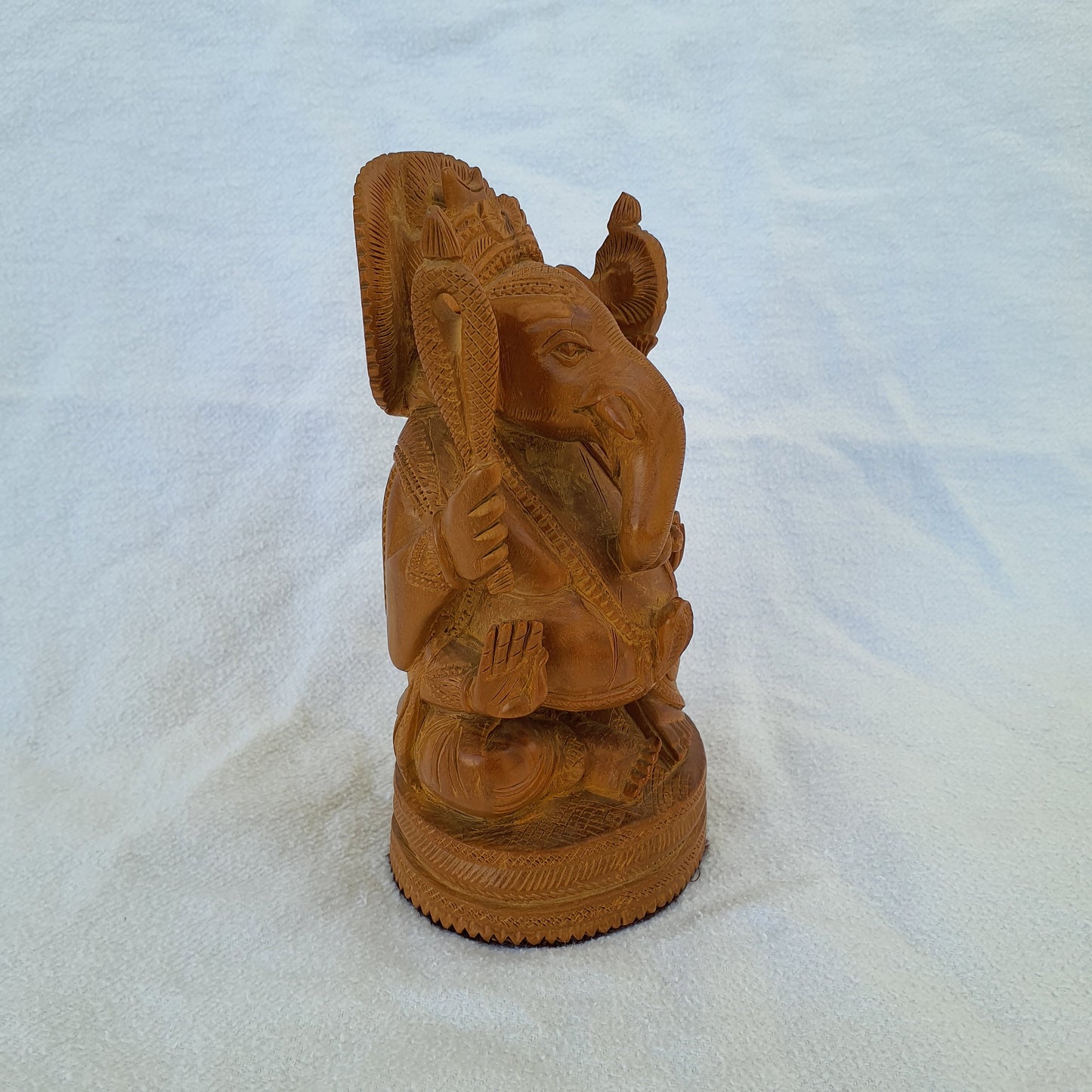 Ganesha figure made of sandalwood: Artfully carved with spiritual depth