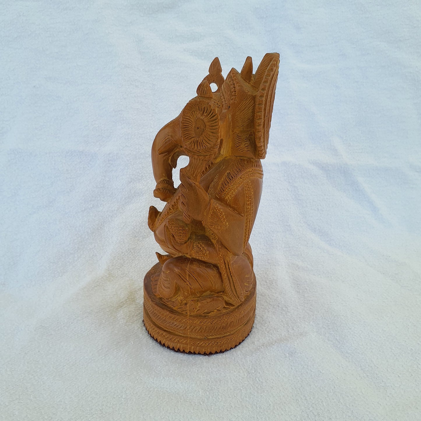 Ganesha figure made of sandalwood: Artfully carved with spiritual depth