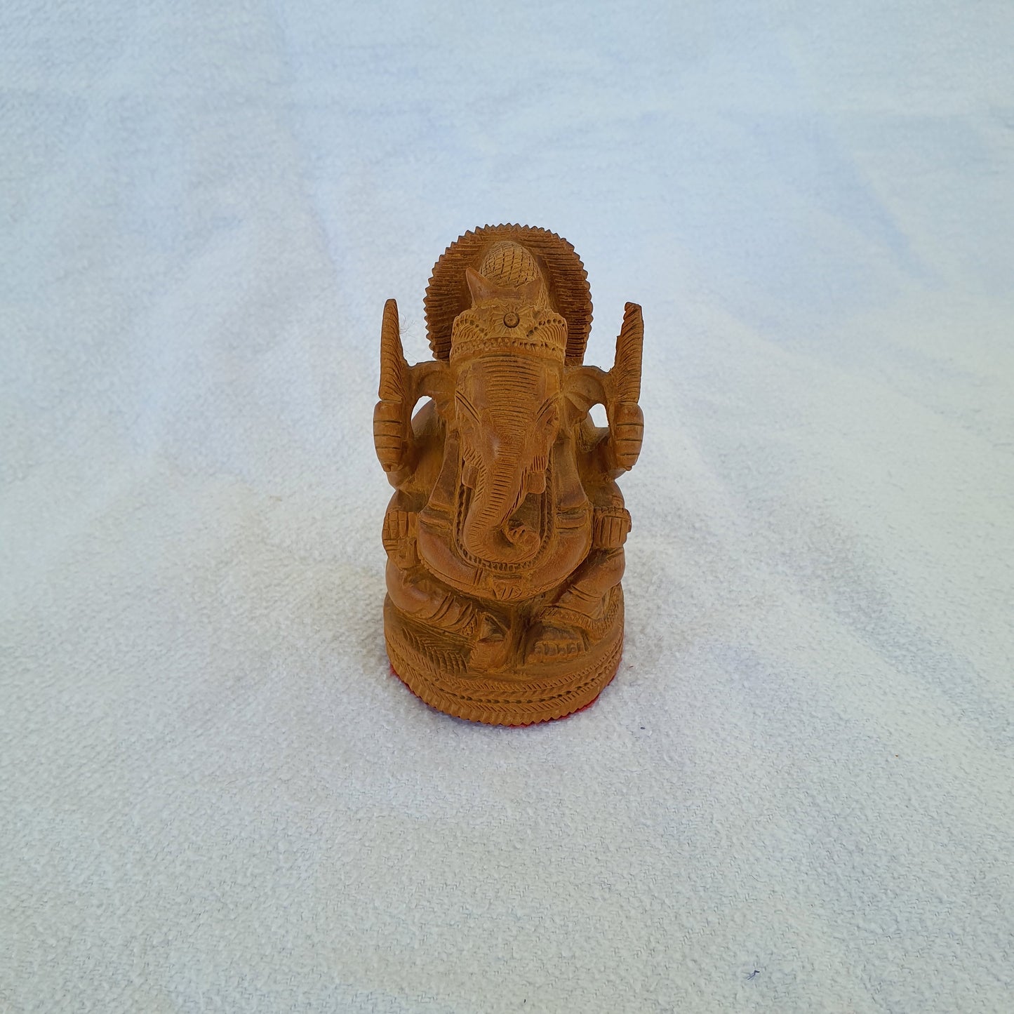 Ganesha figure made of sandalwood: Artfully carved with spiritual depth