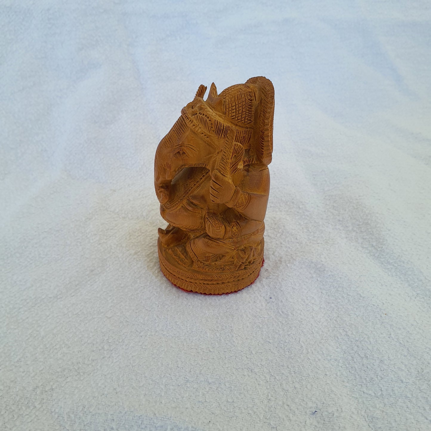 Ganesha figure made of sandalwood: Artfully carved with spiritual depth