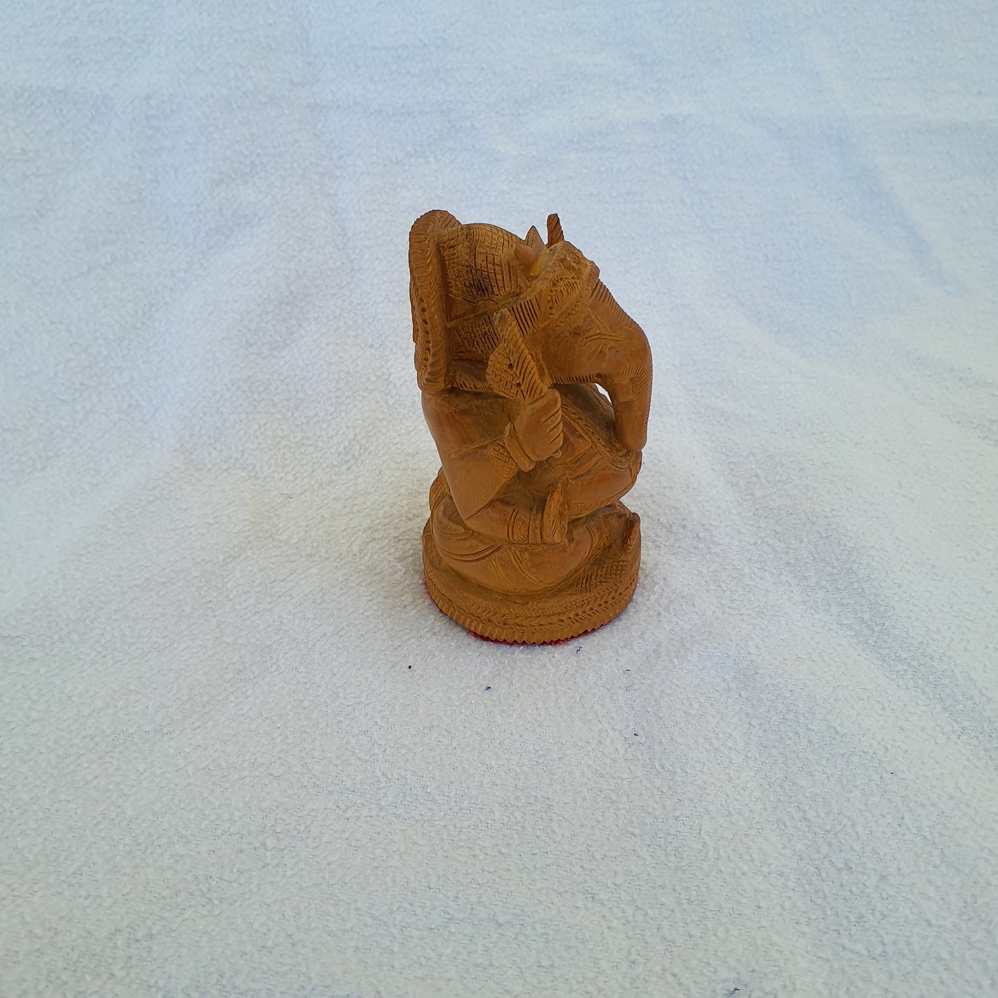 Ganesha figure made of sandalwood: Artfully carved with spiritual depth
