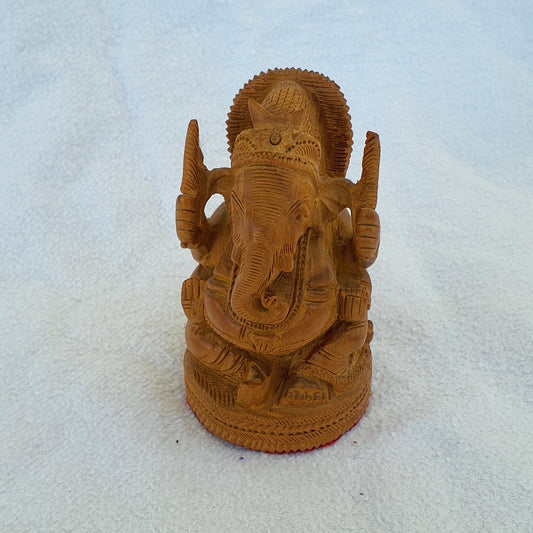 Ganesha figure made of sandalwood: Artfully carved with spiritual depth