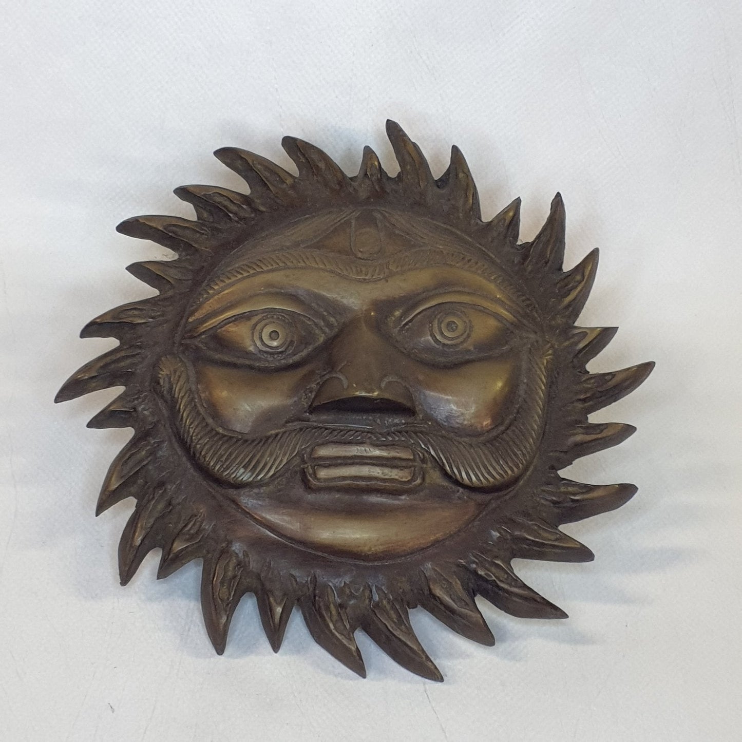 Sun God Surya, patinated brass – handcrafted, Ø 17 cm