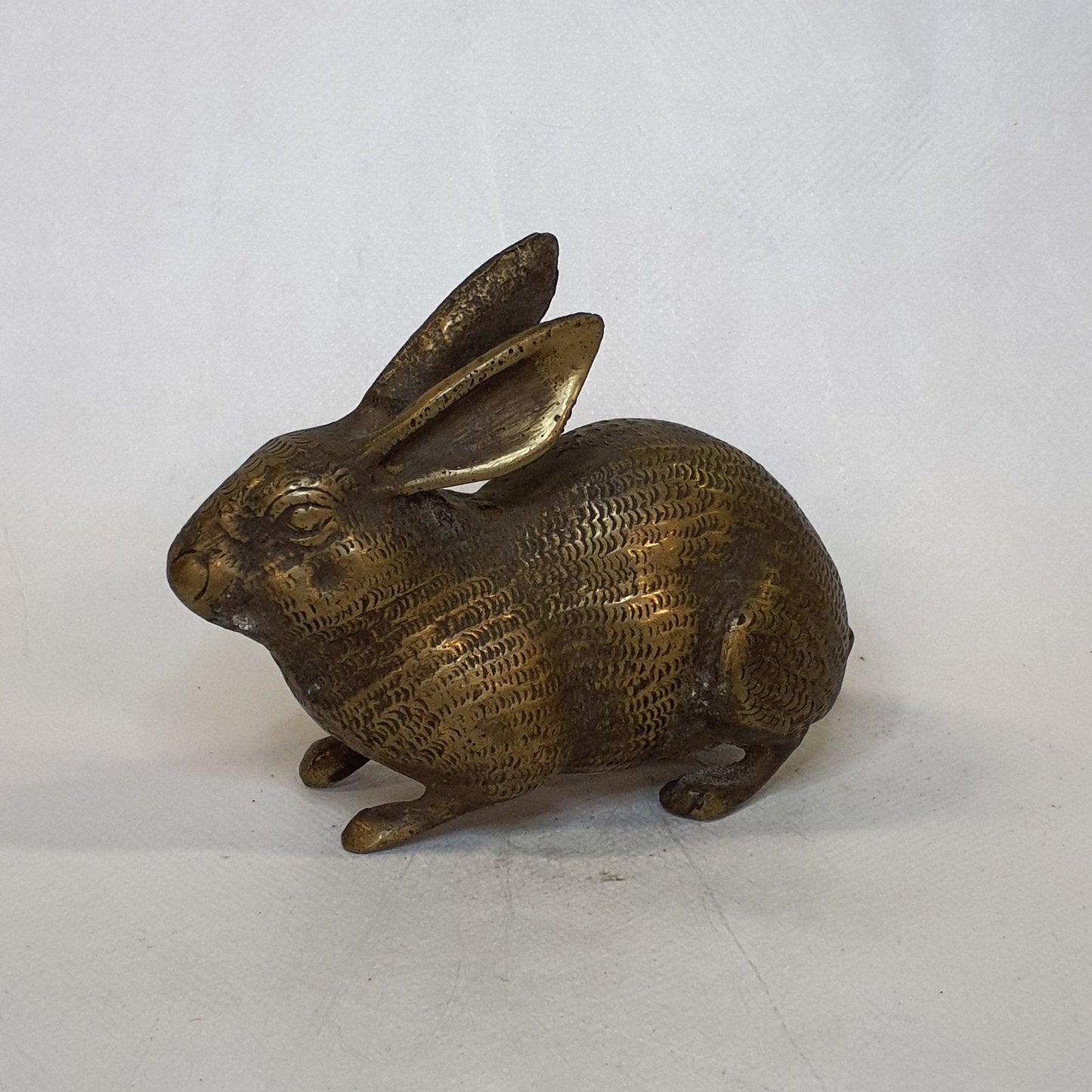 Brass rabbit statue: Hand-forged and patinated using traditional casting methods