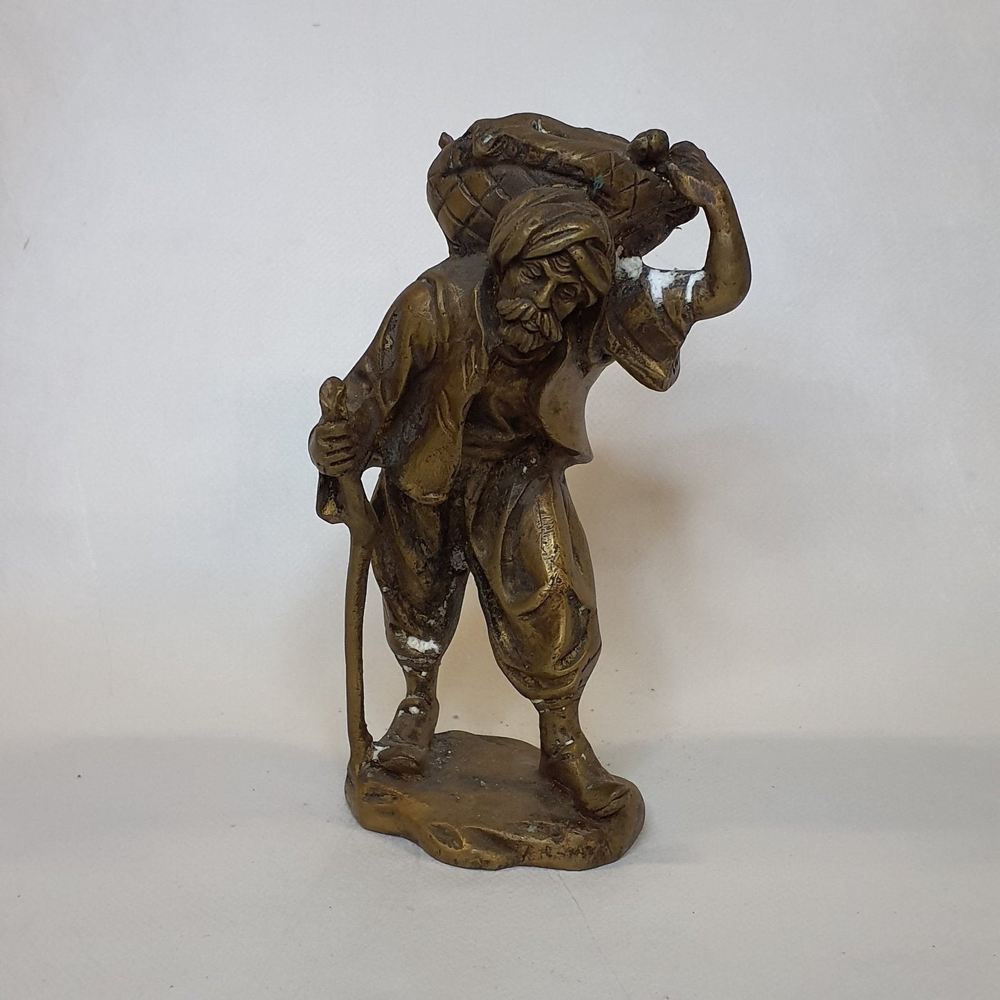 Merchant figure made of brass: Hand-forged and patinated using the traditional casting method