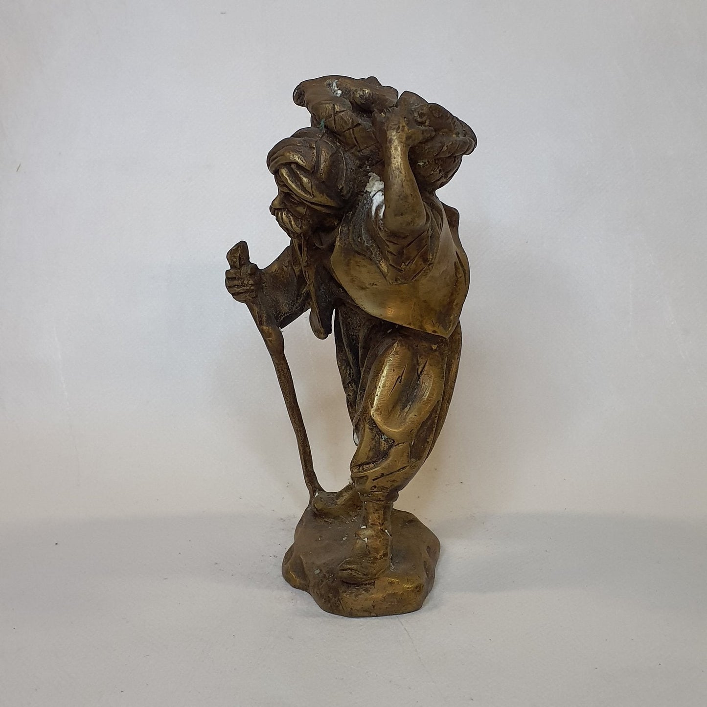 Merchant figure made of brass: Hand-forged and patinated using the traditional casting method
