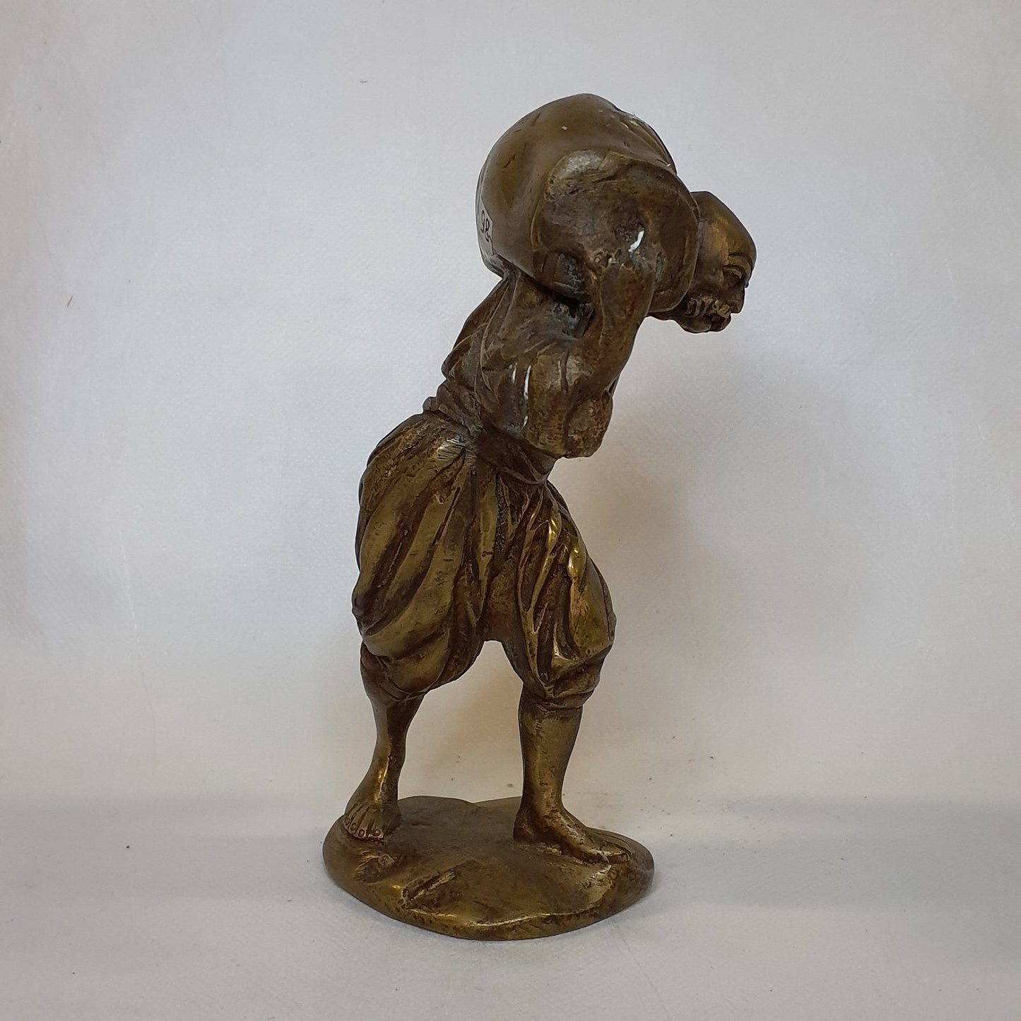 Hafenarbeiter-Figur aus Messing: Handgeschmiedet und patiniert im traditionellen Gussverfahren