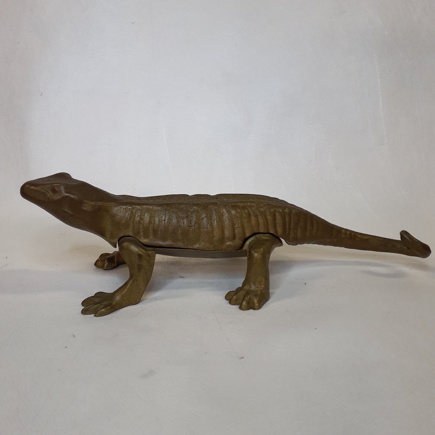 Handcrafted brass lizard: Traditional nutcracker made using the lost-wax casting process