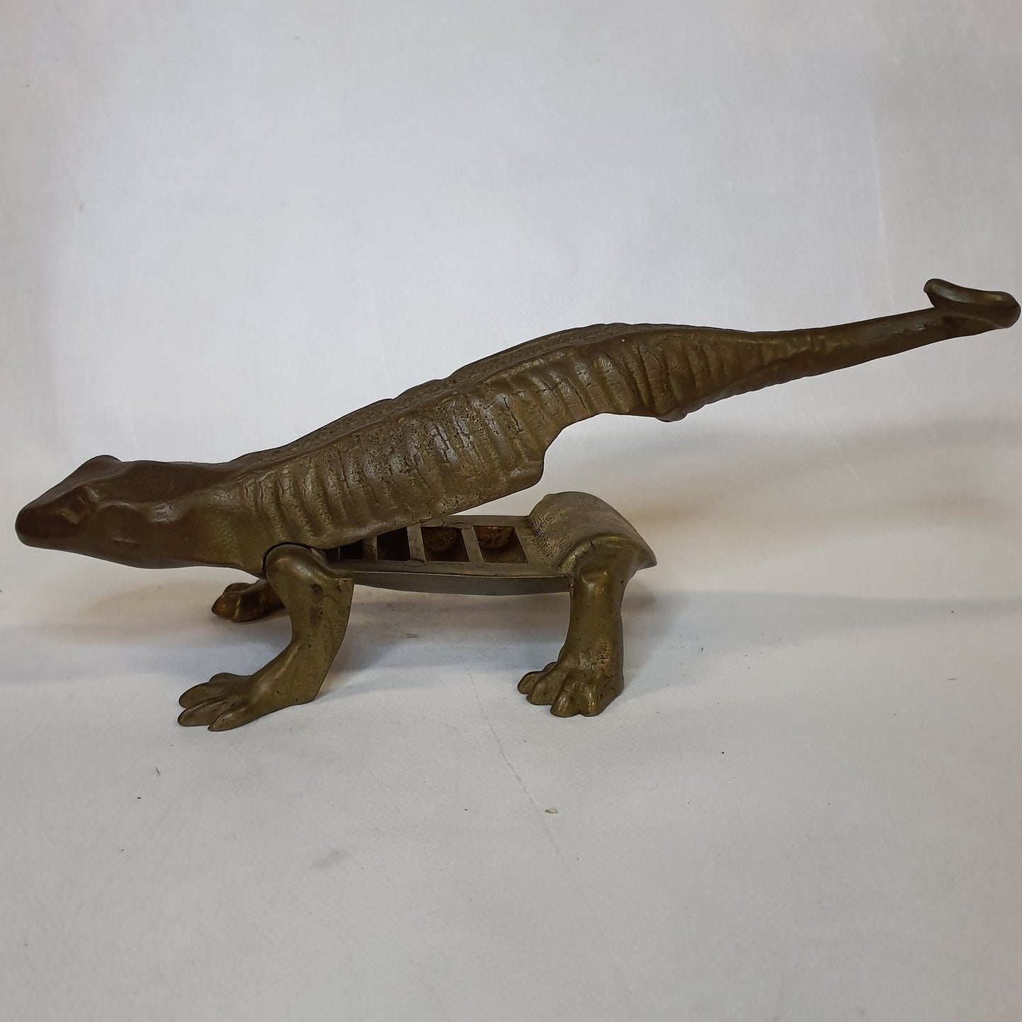 Handcrafted brass lizard: Traditional nutcracker made using the lost-wax casting process