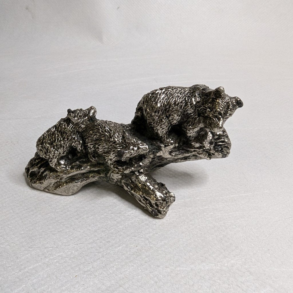 Bears on a log: Detailed tin figurine for nature lovers