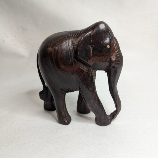Elephant statue made of rosewood: Hand-carved unique piece with a refined fragrance