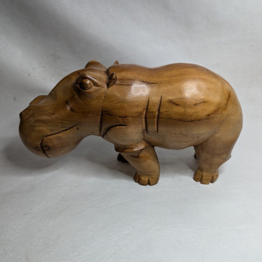 Hand-carved Iroko hippopotamus: sculpture made of solid African teak wood