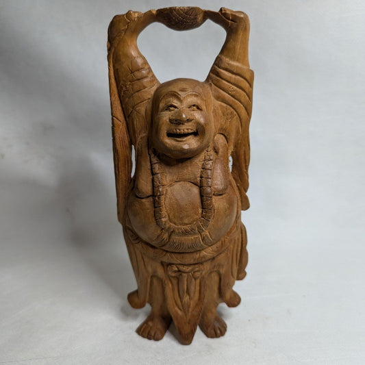 Buddha relief made of sandalwood: Hand-carved decorative element for spiritual tranquility