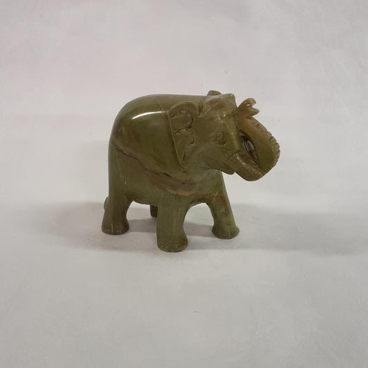 Elephant statue made of soapstone: Hand-carved symbol of luck and strength