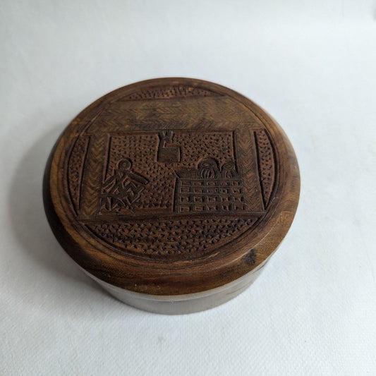 Round teak wood box with brass and wood inlay: Elegant, handcrafted storage.