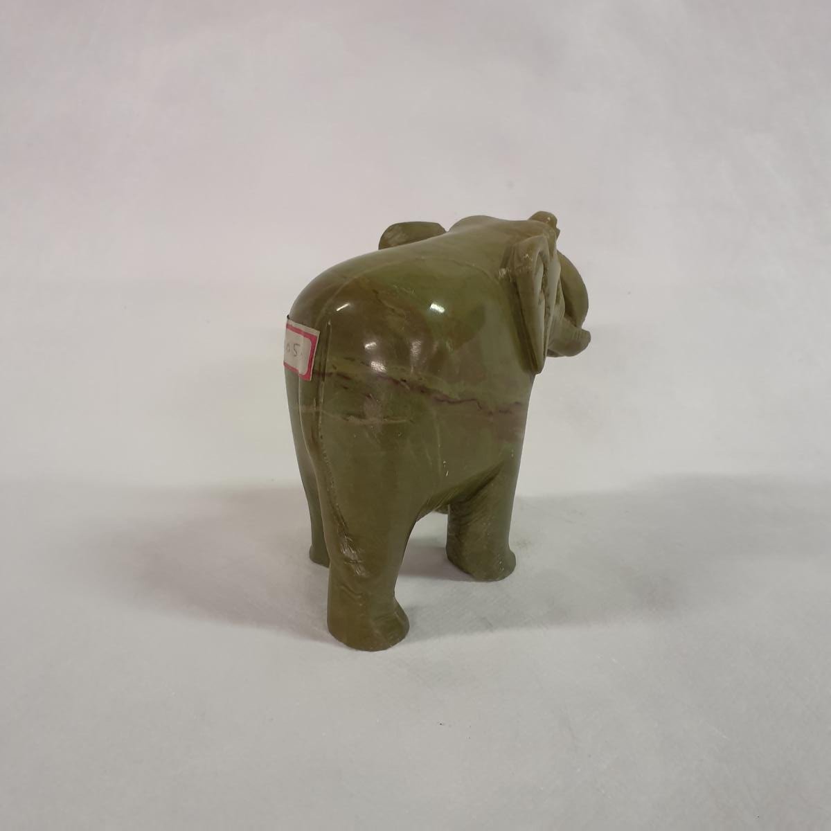 Elephant statue made of soapstone: Hand-carved symbol of luck and strength