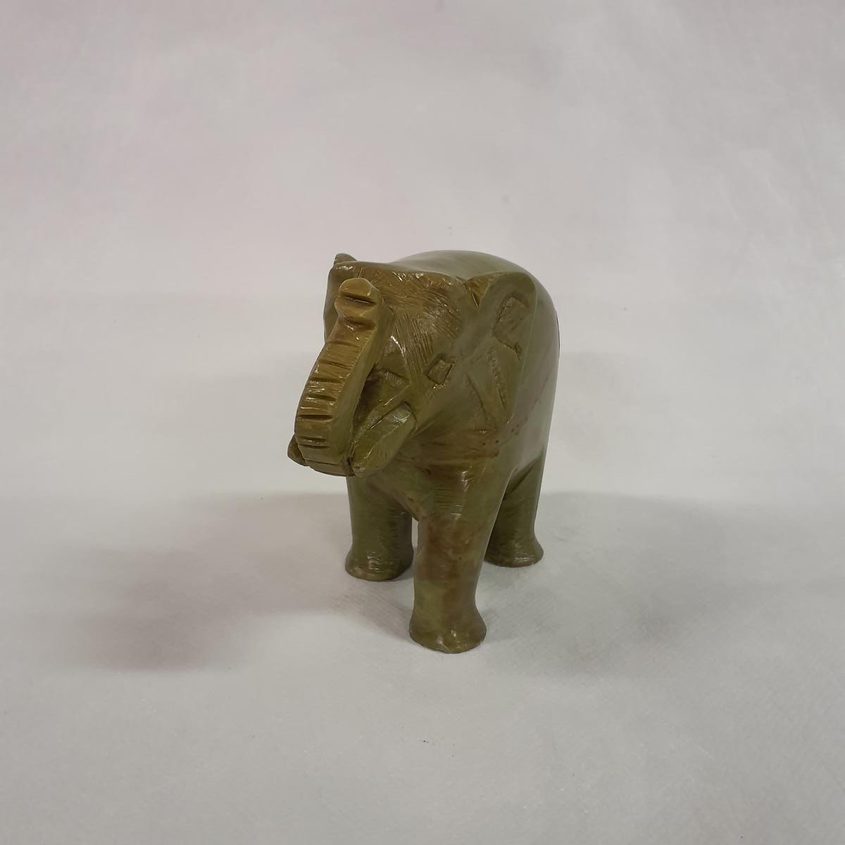 Elephant statue made of soapstone: Hand-carved symbol of luck and strength