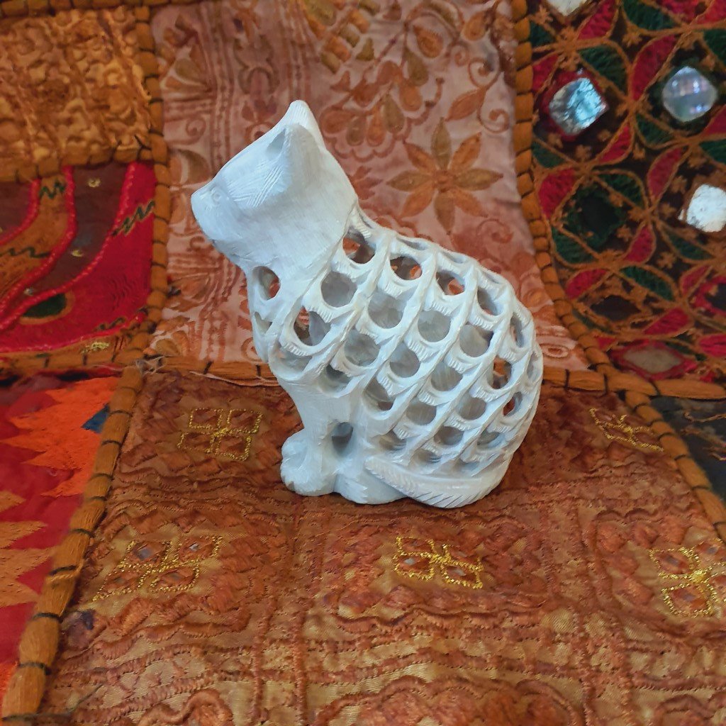 Hand-carved soapstone cat: sculpture with a hidden kitten inside