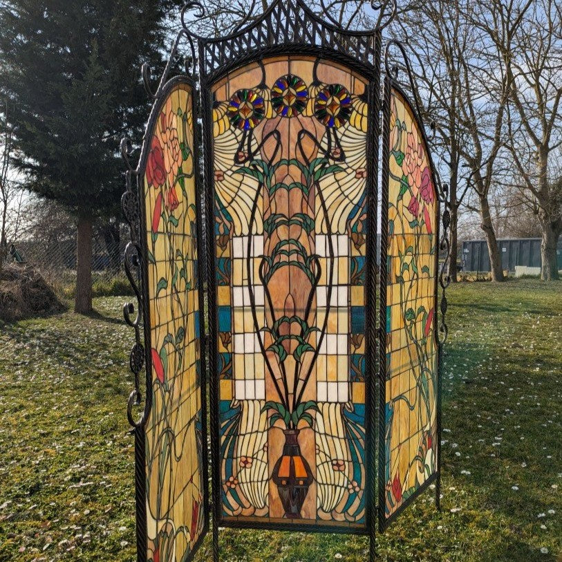 Tiffany room divider: Exclusive interplay of light with a wrought iron metal frame