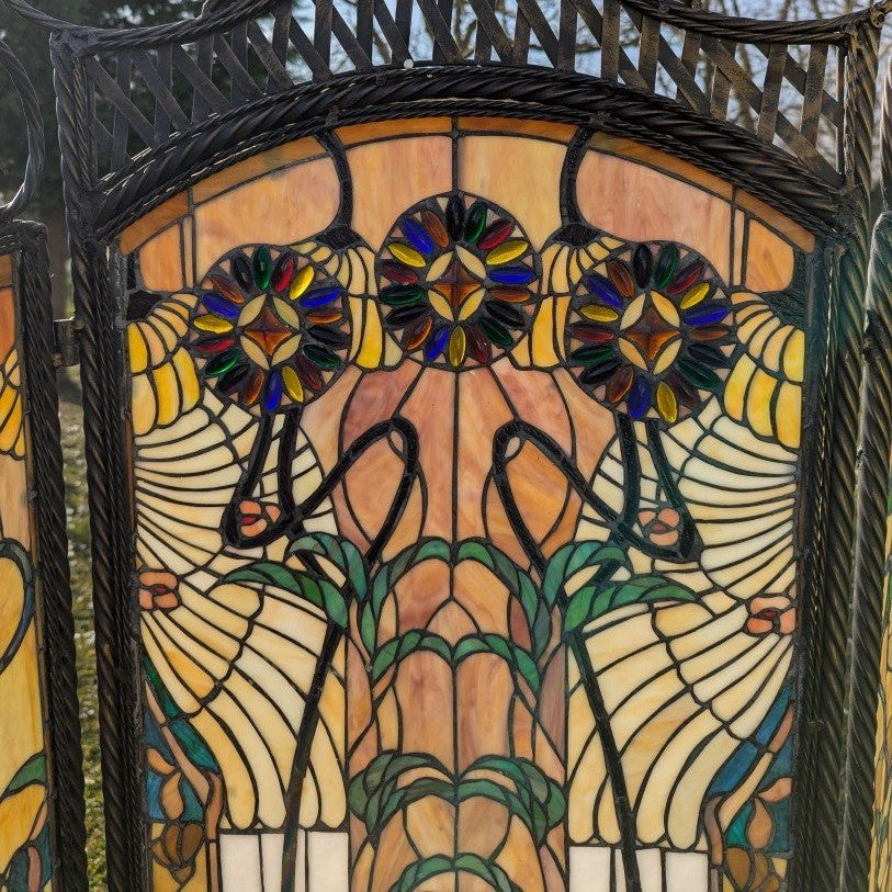 Tiffany room divider: Exclusive interplay of light with a wrought iron metal frame