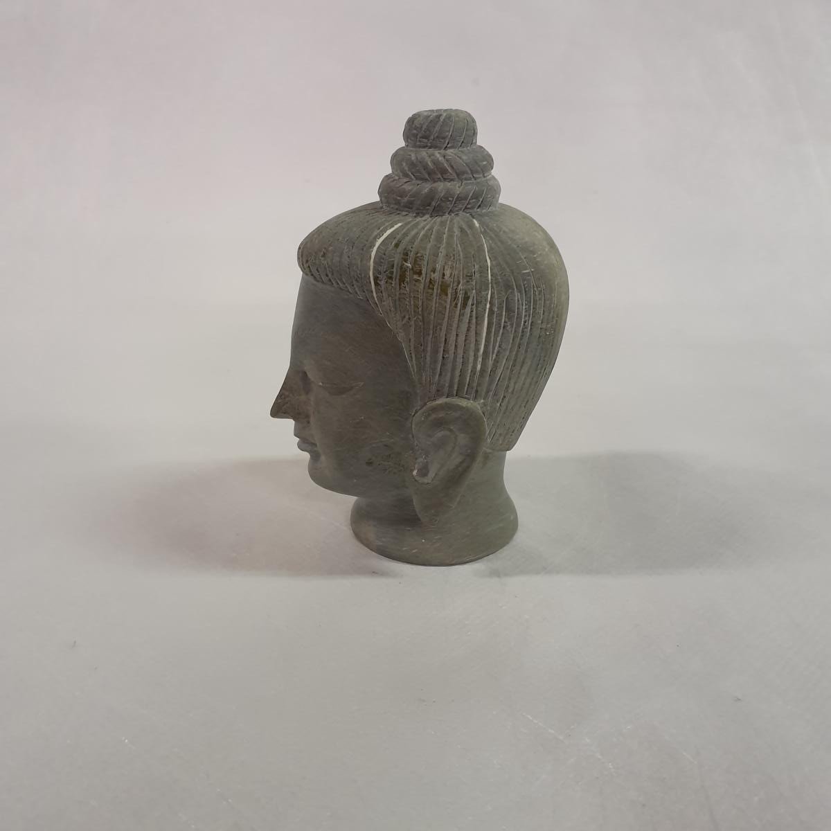 Buddha head carved from soapstone: Hand-carved symbol of inner peace