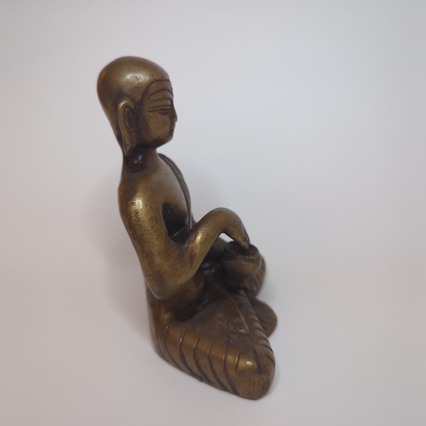 Brass Buddha statue: Handcrafted unique piece using the lost-wax casting method