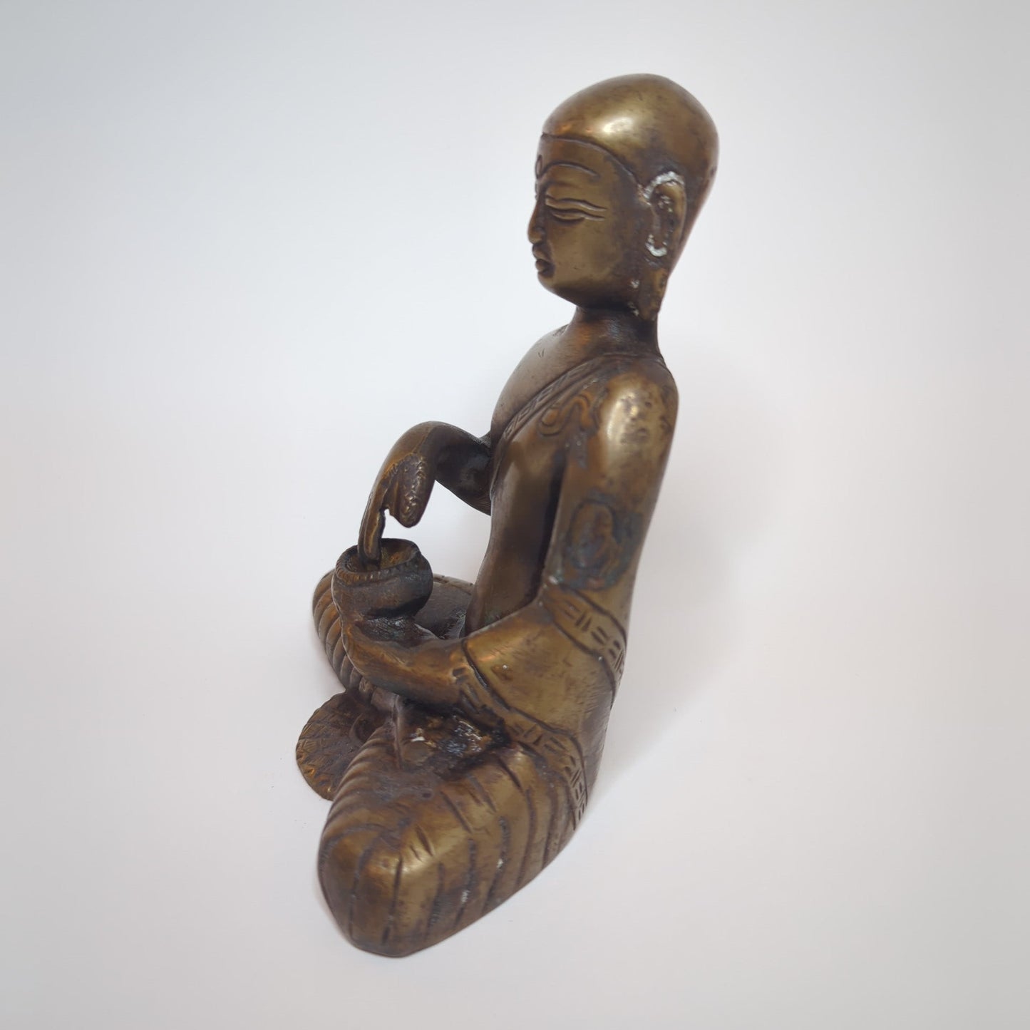 Brass Buddha statue: Handcrafted unique piece using the lost-wax casting method