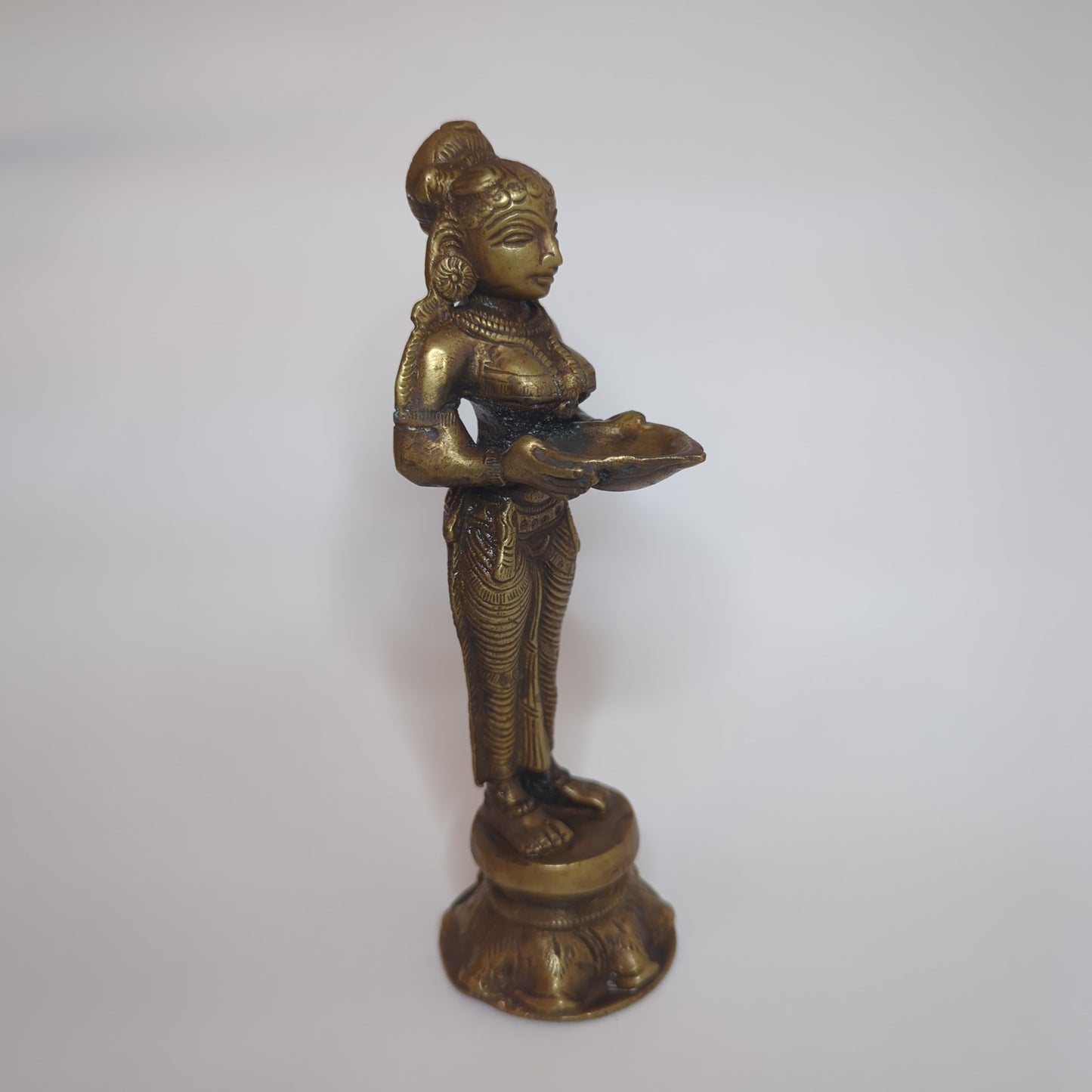 Deepa Lakshmi statue made of brass: Hand-forged and patinated using the traditional casting method