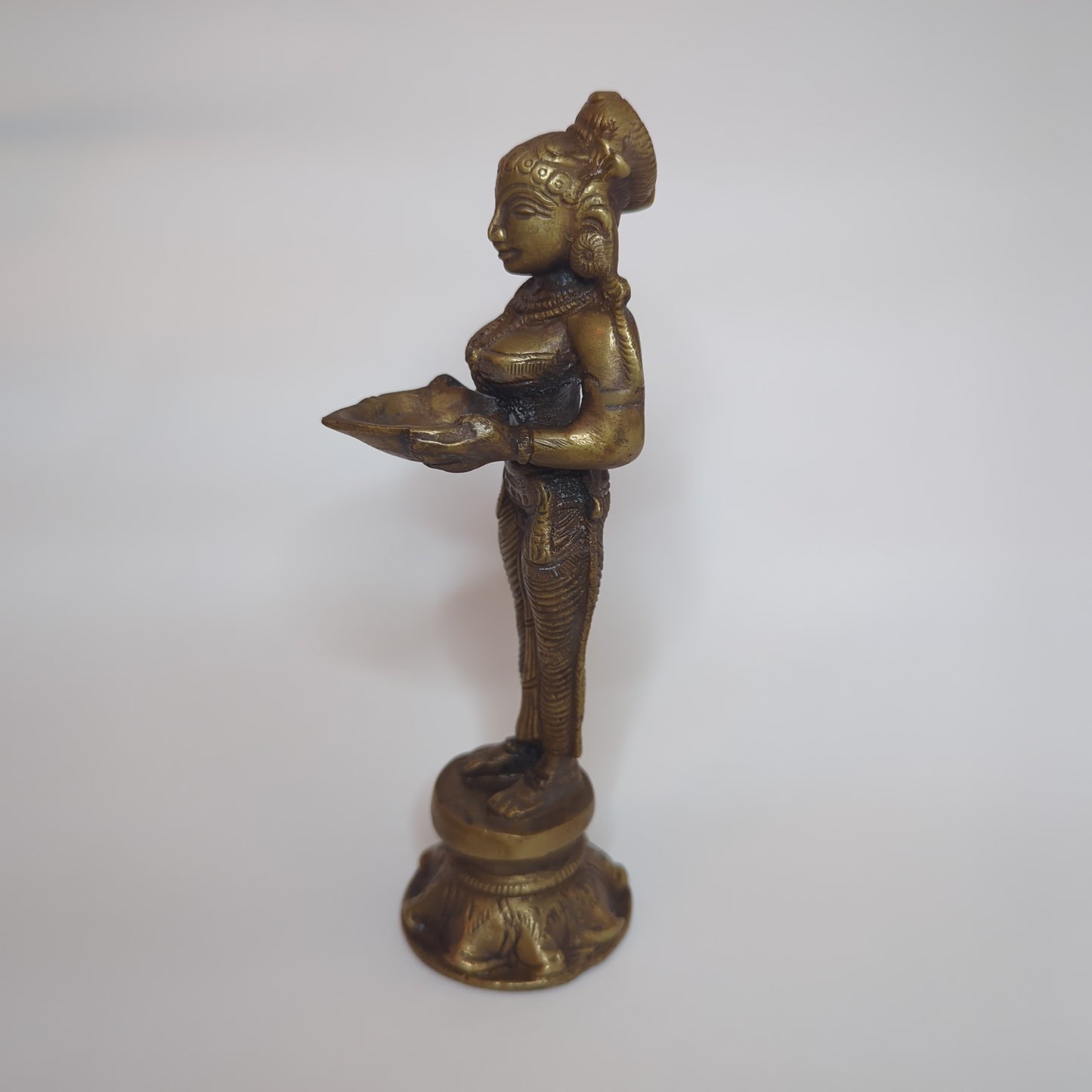 Deepa Lakshmi statue made of brass: Hand-forged and patinated using the traditional casting method