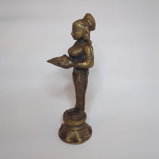 Deepa Lakshmi statue made of brass: Hand-forged and patinated using the traditional casting method